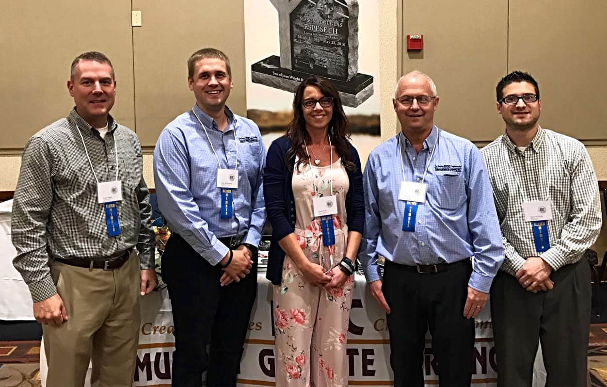 The Murphy Granite Carving Team at a tradeshow